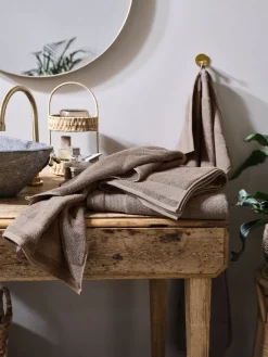 NORAGoldServiette de toilette NORA 50x100 sable foncé